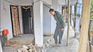 A-man-inspects-the-damages-at-his-residence-in-Jos_1673636035868 (1)