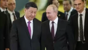 Chinese-President-Xi-Jinping--left--and-Russian-Pr_1679309182318 (1)