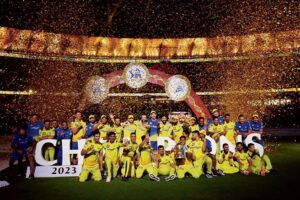 Chennai Super Kings’ players celebrate with the trophy